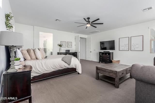 carpeted bedroom with visible vents and a ceiling fan