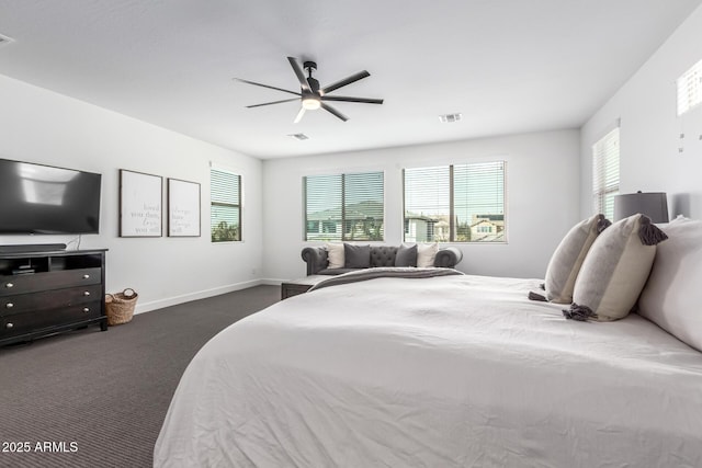 carpeted bedroom featuring visible vents, ceiling fan, and baseboards