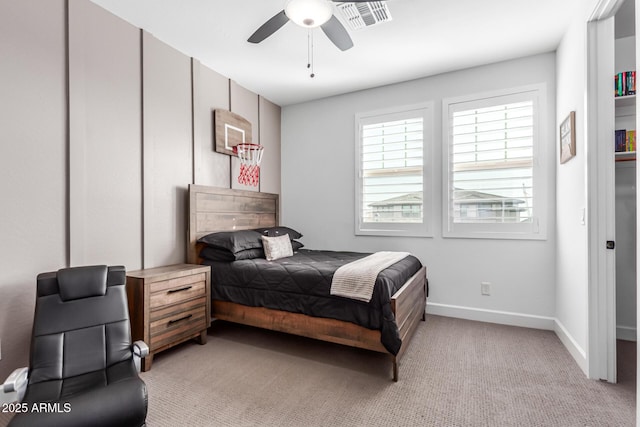 bedroom featuring visible vents, ceiling fan, light carpet, and baseboards