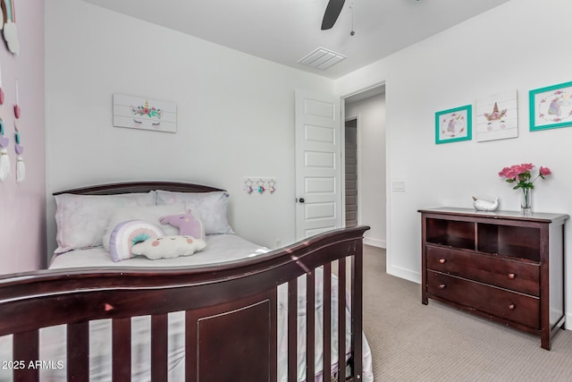 bedroom featuring ceiling fan, carpet, visible vents, and baseboards