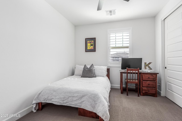 bedroom featuring carpet flooring, ceiling fan, visible vents, and baseboards