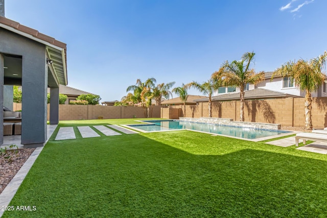 view of yard featuring a patio area, a fenced backyard, and a fenced in pool