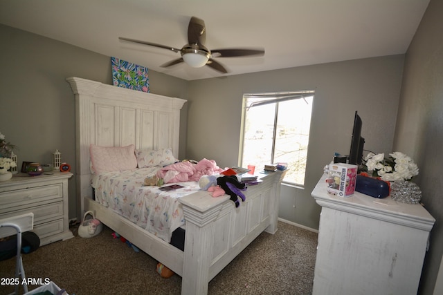 bedroom with baseboards, ceiling fan, and carpet flooring