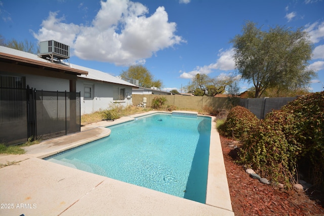 view of pool with central AC unit, a fenced in pool, and a fenced backyard