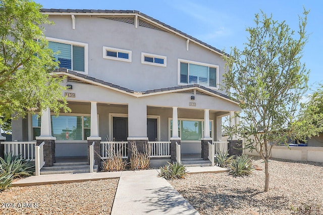 view of front of home featuring covered porch