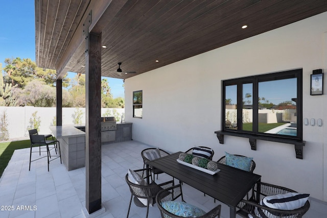 6126 E Charter Oak Rd, Scottsdale, AZ 85254 - view of patio with area for grilling, outdoor dining area, and a ceiling fan