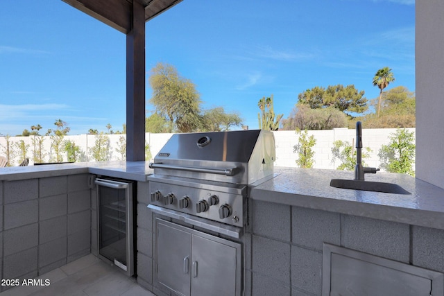 6126 E Charter Oak Rd, Scottsdale, AZ 85254 - view of patio with beverage cooler and area for grilling