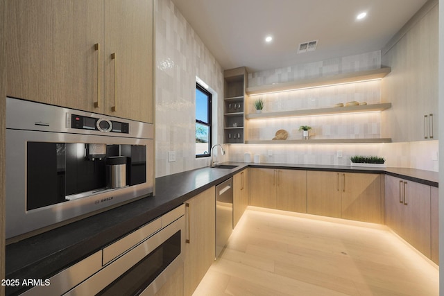 6126 E Charter Oak Rd, Scottsdale, AZ 85254 - kitchen with open shelves, light brown cabinetry, dark countertops, decorative backsplash, and recessed lighting