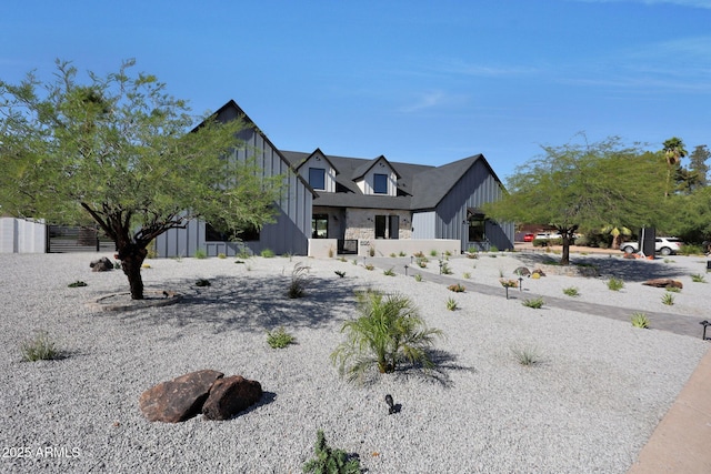 6126 E Charter Oak Rd, Scottsdale, AZ 85254 - view of front of house featuring board and batten siding
