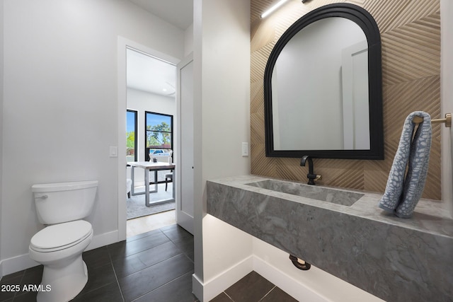 6126 E Charter Oak Rd, Scottsdale, AZ 85254 - bathroom featuring a sink and tile patterned floors