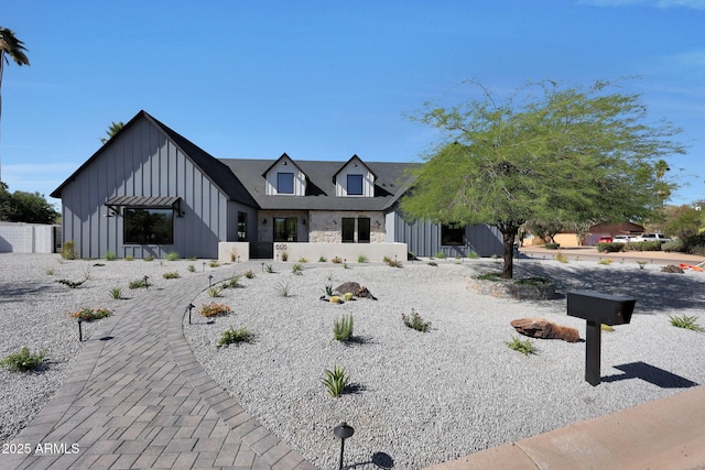 6126 E Charter Oak Rd, Scottsdale, AZ 85254 - modern inspired farmhouse featuring board and batten siding and stone siding