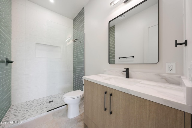 6126 E Charter Oak Rd, Scottsdale, AZ 85254 - full bath with vanity, tiled shower, and tile patterned flooring