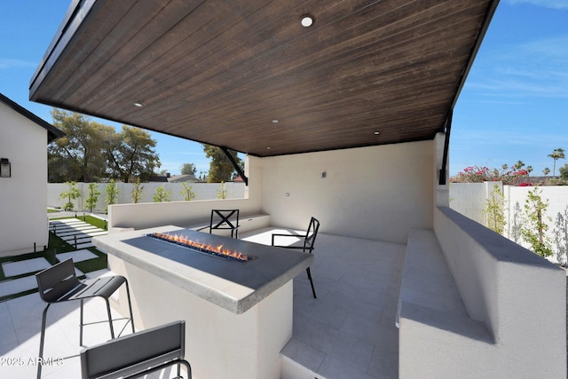 6126 E Charter Oak Rd, Scottsdale, AZ 85254 - fenced backyard with a fire pit and a patio