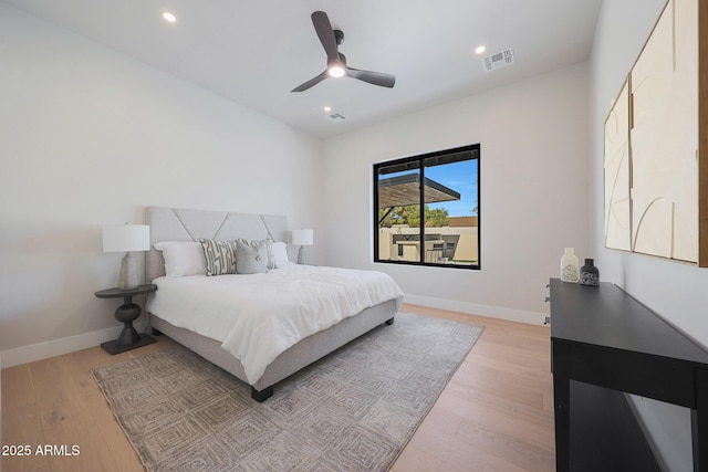 6126 E Charter Oak Rd, Scottsdale, AZ 85254 - bedroom with light wood-style flooring, recessed lighting, and ceiling fan