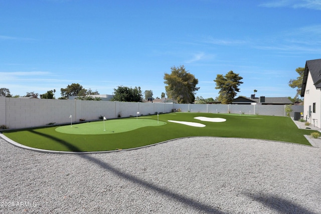 6126 E Charter Oak Rd, Scottsdale, AZ 85254 - fenced backyard with a putting area