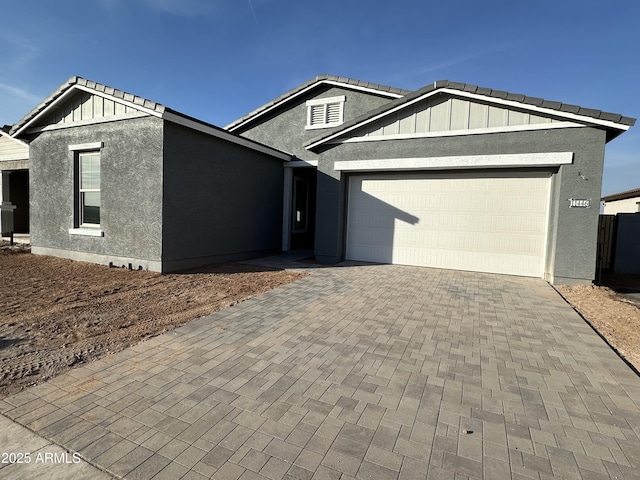 view of front of home with a garage