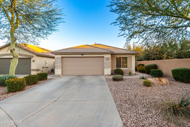 view of front of property featuring a garage