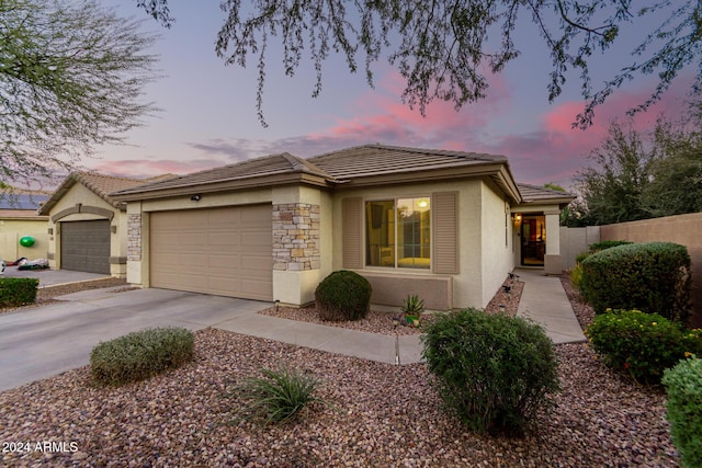 view of front of property featuring a garage