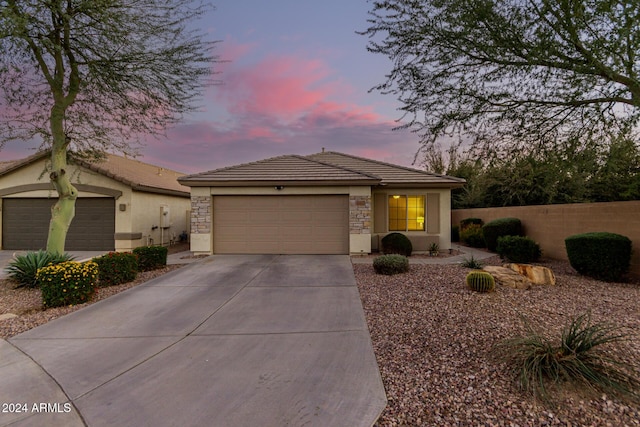 view of front of home with a garage