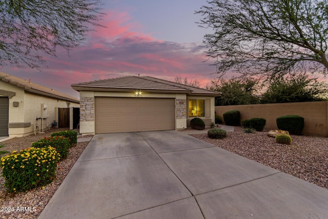 view of front of property featuring a garage