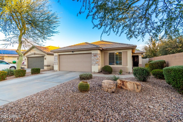 view of front of property featuring a garage