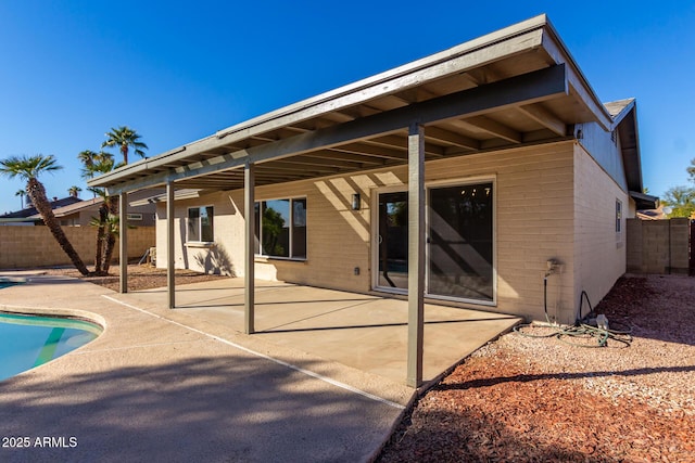 back of property featuring a patio