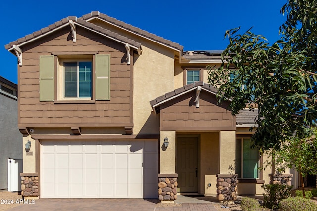 view of front of home featuring a garage