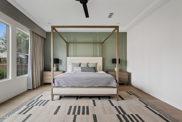 bedroom with light hardwood / wood-style floors