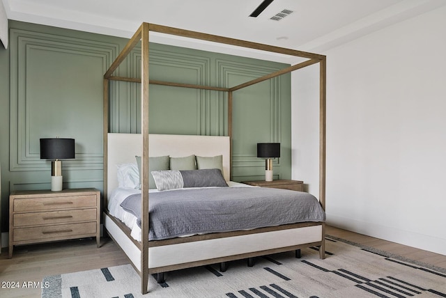 bedroom featuring light hardwood / wood-style flooring