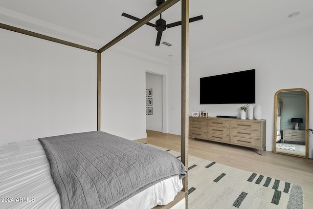 bedroom featuring ceiling fan and light hardwood / wood-style flooring