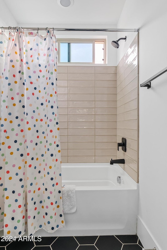 bathroom featuring shower / bath combo and tile patterned floors