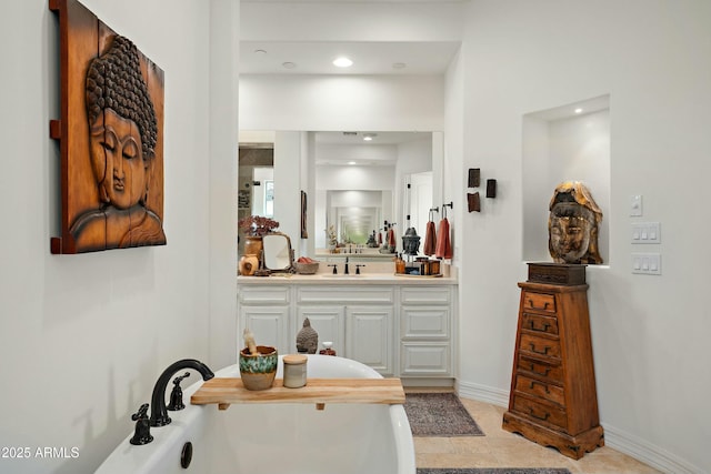 10799 E Florence Way, Scottsdale, AZ 85262 - full bathroom with a bath, vanity, baseboards, and recessed lighting