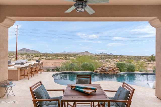 10799 E Florence Way, Scottsdale, AZ 85262 - view of swimming pool with a patio, a mountain view, a fenced in pool, and fence