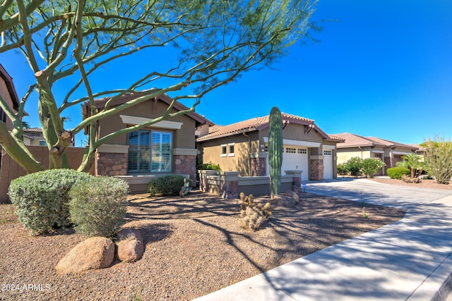 view of front of property with a garage