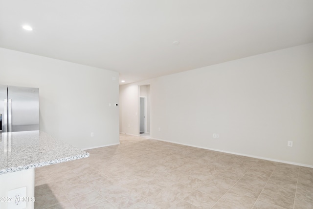 5516 E Mearn Rd, San Tan Valley, AZ 85140 - unfurnished living room featuring recessed lighting
