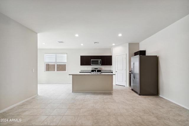 5516 E Mearn Rd, San Tan Valley, AZ 85140 - kitchen featuring stainless steel appliances, a kitchen island with sink, recessed lighting, baseboards, and open floor plan