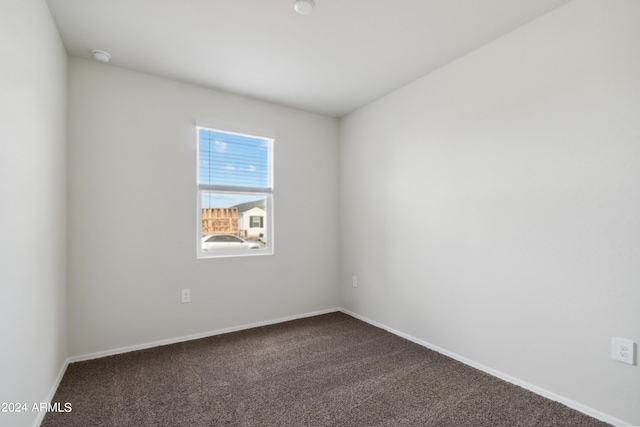 5516 E Mearn Rd, San Tan Valley, AZ 85140 - empty room with dark carpet and baseboards