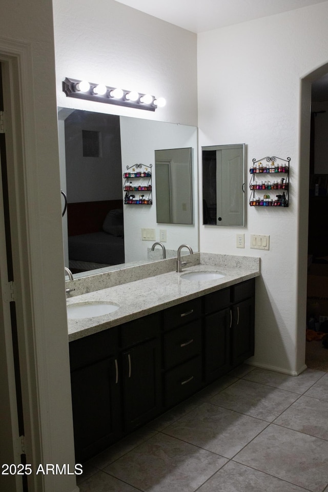 bathroom with vanity and tile patterned flooring