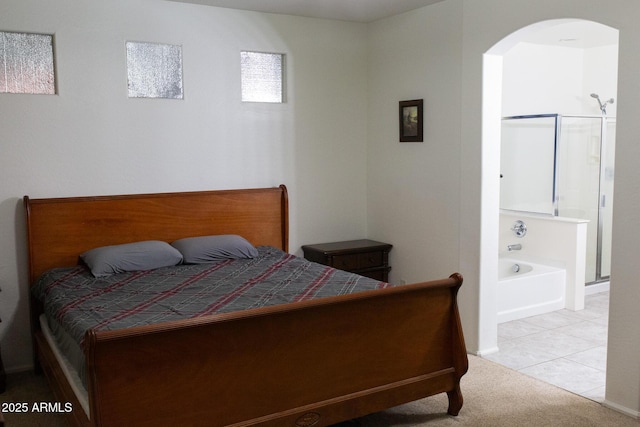 bedroom with light tile patterned flooring