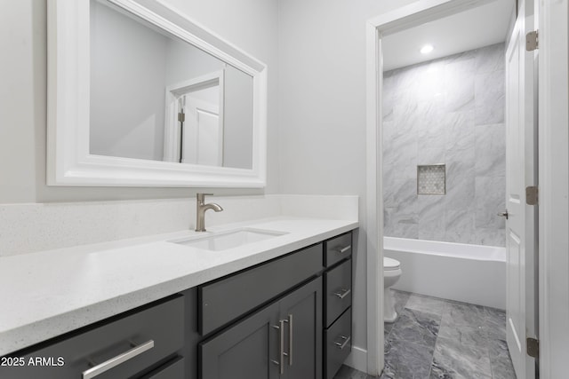 9310 W Washington St, Tolleson, AZ 85353 - bathroom featuring toilet, vanity, and washtub / shower combination