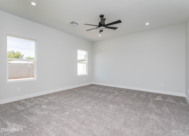 9310 W Washington St, Tolleson, AZ 85353 - spare room with carpet floors, ceiling fan, recessed lighting, and baseboards