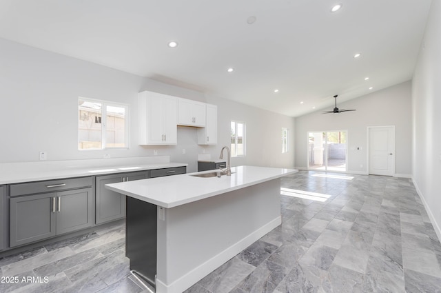 9310 W Washington St, Tolleson, AZ 85353 - kitchen with a sink, recessed lighting, gray cabinetry, a center island with sink, and baseboards