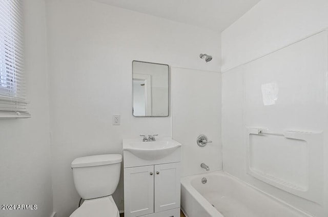 full bath with shower / bath combination, toilet, and vanity