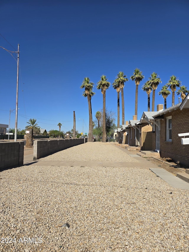 view of yard with a residential view and fence