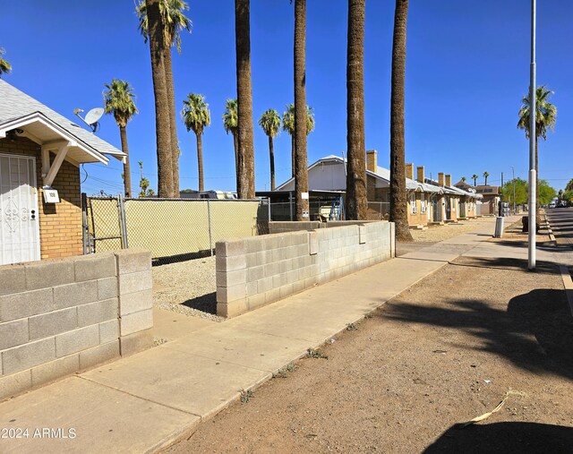 view of yard with fence and a residential view