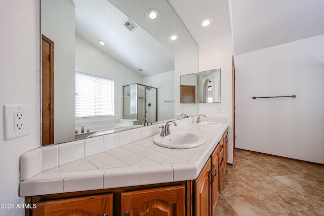 full bath featuring a sink, visible vents, a shower stall, and vaulted ceiling