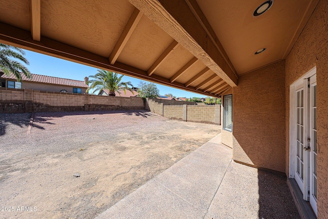 view of yard with a patio area and a fenced backyard