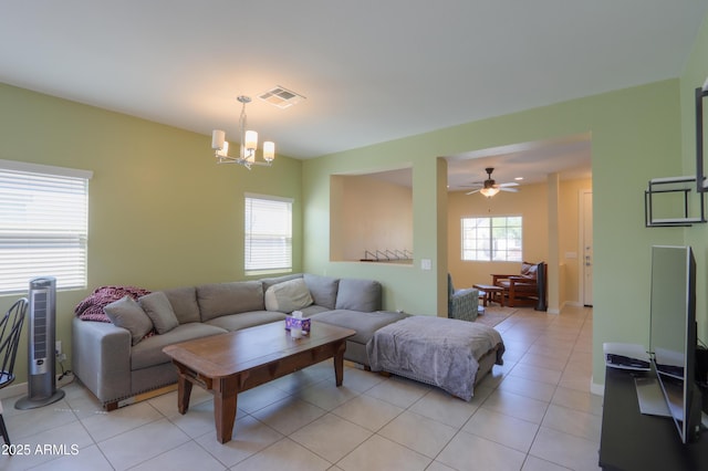 17743 N Rosa Dr, Maricopa, AZ 85138 - living area featuring ceiling fan with notable chandelier, visible vents, and light tile patterned floors