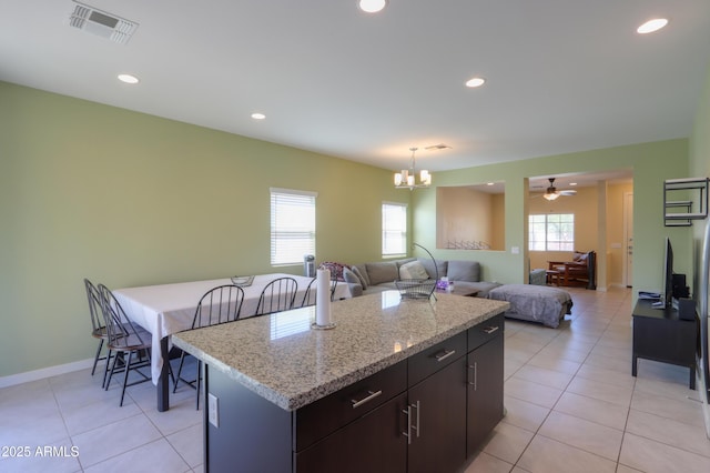 17743 N Rosa Dr, Maricopa, AZ 85138 - kitchen with visible vents, recessed lighting, and light tile patterned floors