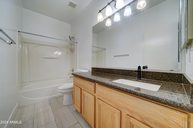 full bathroom with tub / shower combination, vanity, and toilet